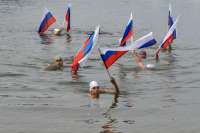 В Красноярском крае День государственного флага отметили заплывом по водохранилищу