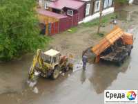 В Минусинске справляются с последствиями грозы (фото)