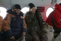 Спасатели Хакасии на вертолете доставили из тайги в Минусинск больного охотника