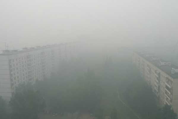 Горящие китайские теплицы погрузили добрую часть Минусинска в дым